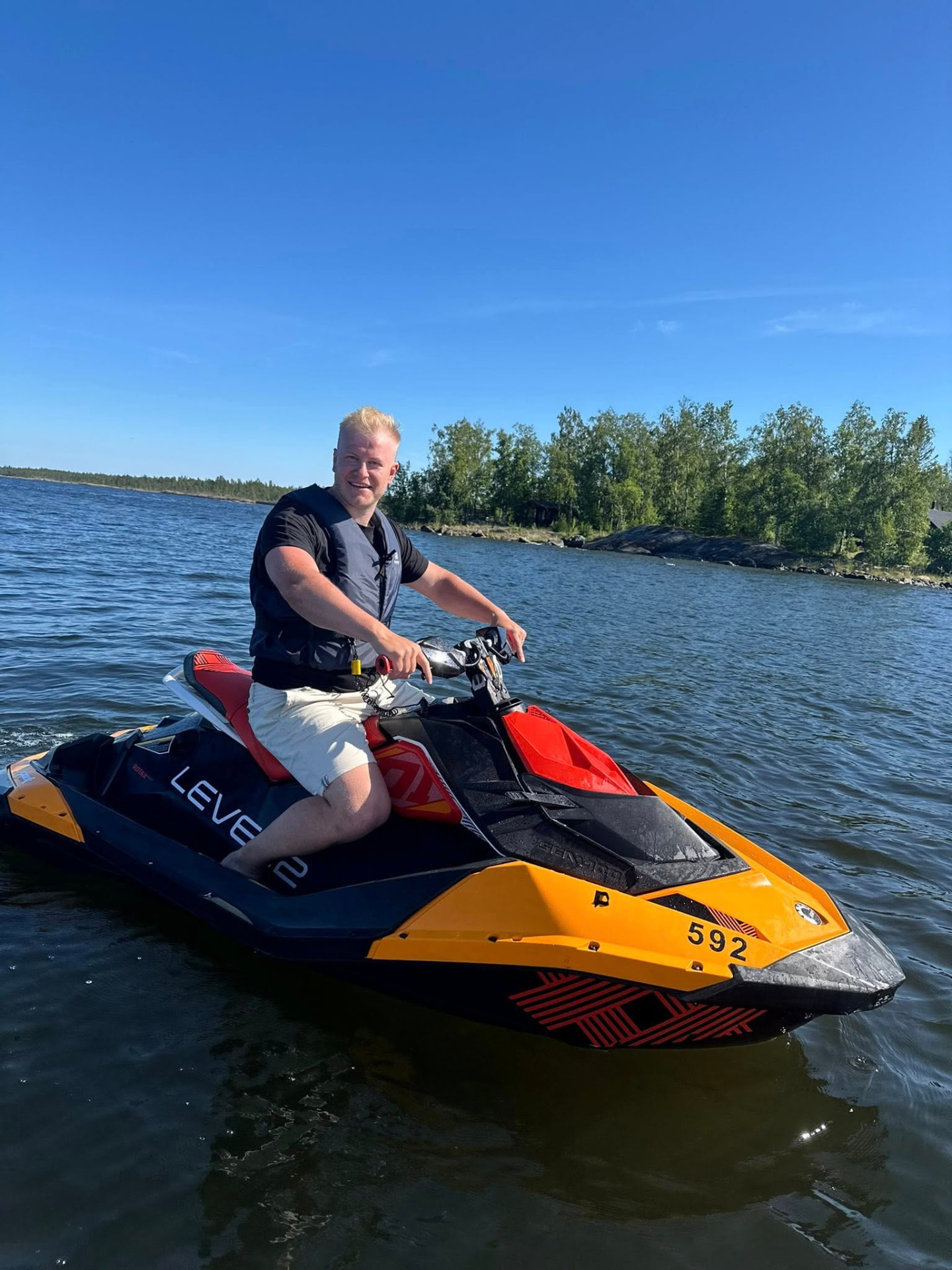 Gusten Sun riding a jet ski